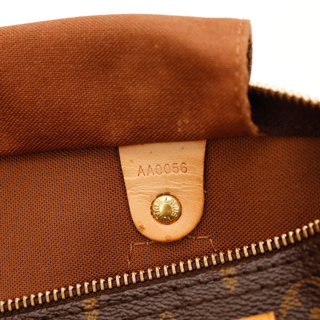 Détail anses vachette patine caramel Louis Vuitton Speedy 30 — AMANA Vintage