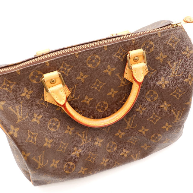Détail tirette cuir et zip Louis Vuitton Speedy 30 occasion — AMANA Vintage