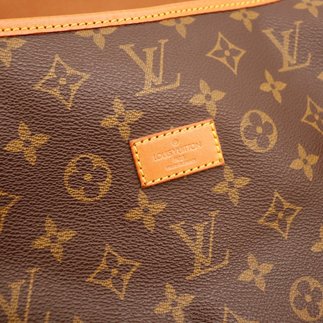 Vue d'ensemble Louis Vuitton Saumur 35 Toile Monogramme Marron occasion authentique — AMANA Vintage