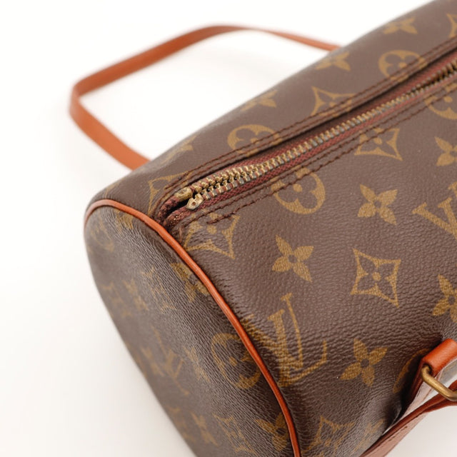 Détail de la fermeture Louis Vuitton Papillon 26 Toile Monogramme occasion authentique — AMANA Vintage