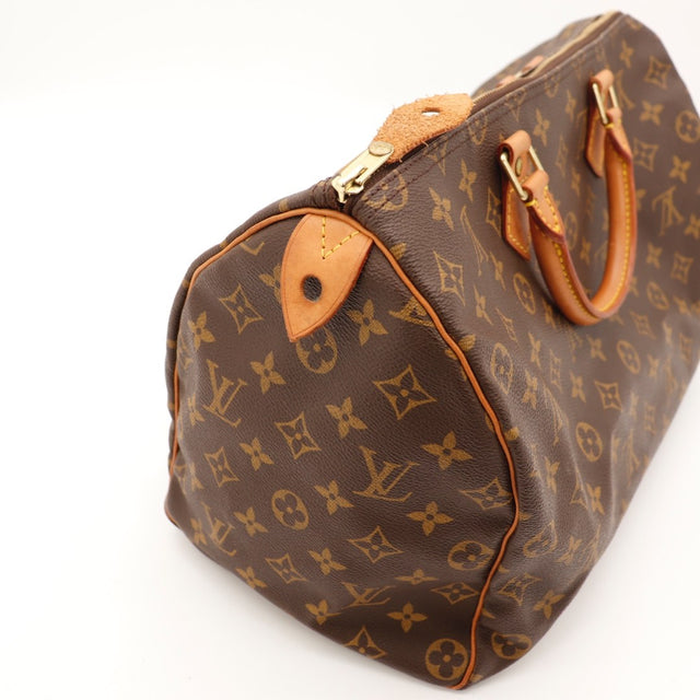 Détail de la toile Louis Vuitton Speedy 30 Toile Monogramme occasion authentique — AMANA Vintage