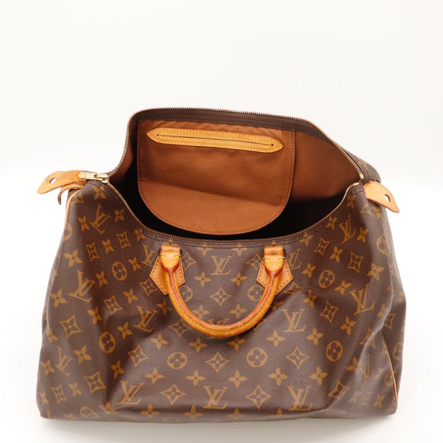 Détail de la fermeture Louis Vuitton Speedy 35 Toile Monogramme occasion authentique — AMANA Vintage