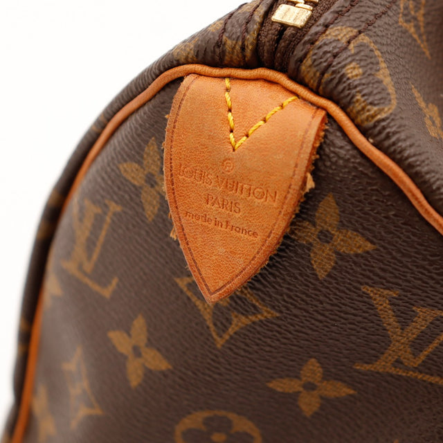 Détail anse Louis Vuitton Speedy 25 usure cuir blanchi — AMANA Vintage