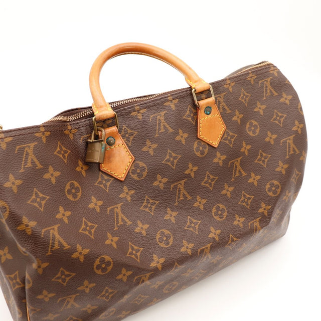Détail du date code Louis Vuitton Speedy 35 Toile Monogramme occasion authentique — AMANA Vintage