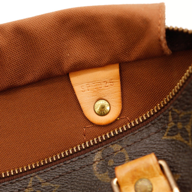 Détail date code Louis Vuitton Speedy 25 languette intérieure — AMANA Vintage