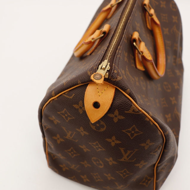 Détail de l'argenterie Louis Vuitton Speedy 35 Toile Monogramme occasion authentique — AMANA Vintage