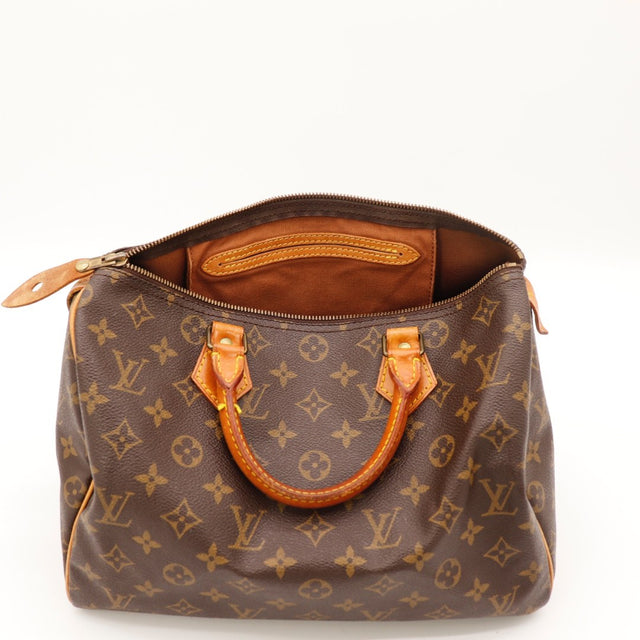 Vue du dessous Louis Vuitton Speedy 30 Toile Monogramme occasion authentique — AMANA Vintage
