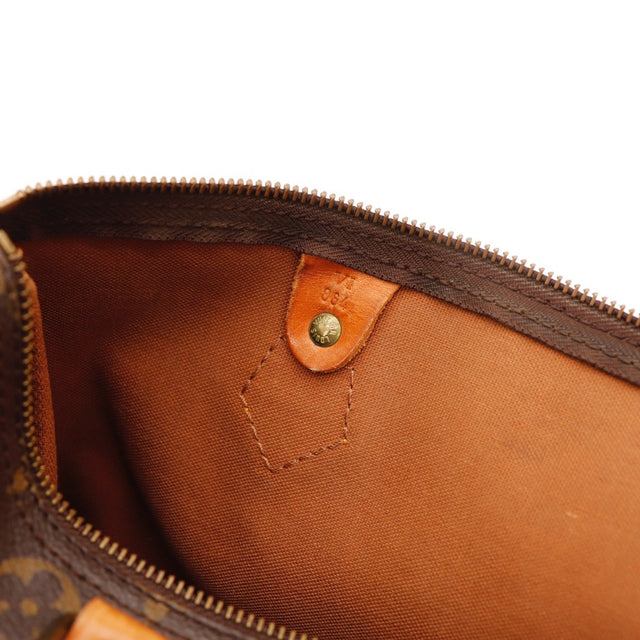 Détail de la patine Louis Vuitton Speedy 30 cuir vachette occasion authentique — AMANA Vintage