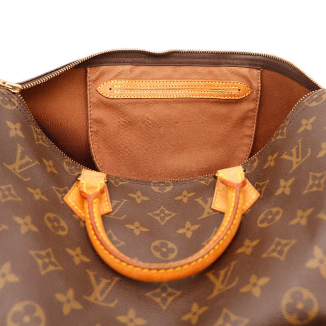 Vue dessus ouvert Louis Vuitton Speedy 35 poignées et zip — AMANA Vintage