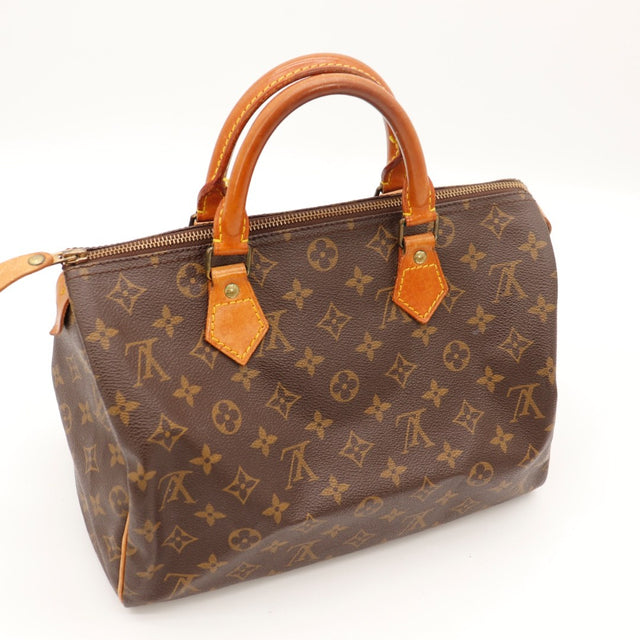 Détail de la languette latérale Louis Vuitton Speedy 30 cuir vachette occasion authentique — AMANA Vintage