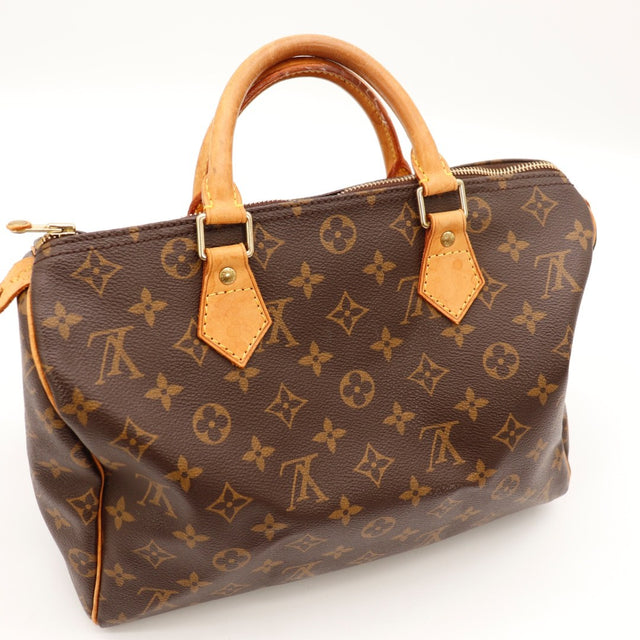 Détail de la fermeture Louis Vuitton Speedy 30 Toile Monogramme occasion authentique — AMANA Vintage