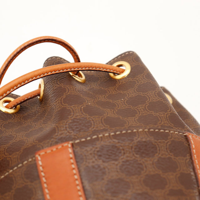 Détail œillets dorés et cordon sac seau Céline Macadam occasion authentique — AMANA Vintage