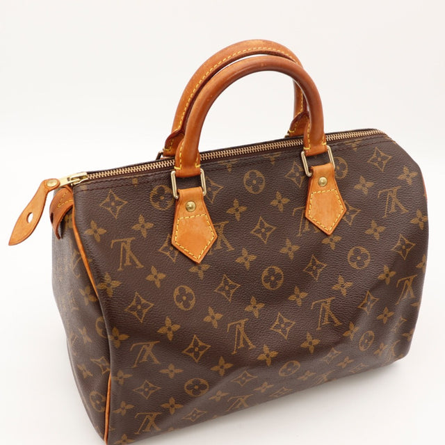Détail du date code Louis Vuitton Speedy 30 Toile Monogramme occasion authentique — AMANA Vintage