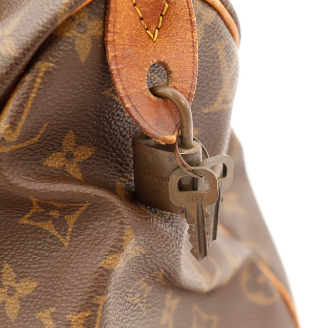 Détail cadenas et clé Louis Vuitton Speedy 30 avec languette vachette — AMANA Vintage