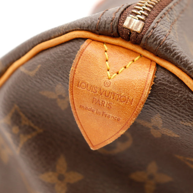 Détail languette cadenas Louis Vuitton Speedy 35 vachette patiné — AMANA Vintage