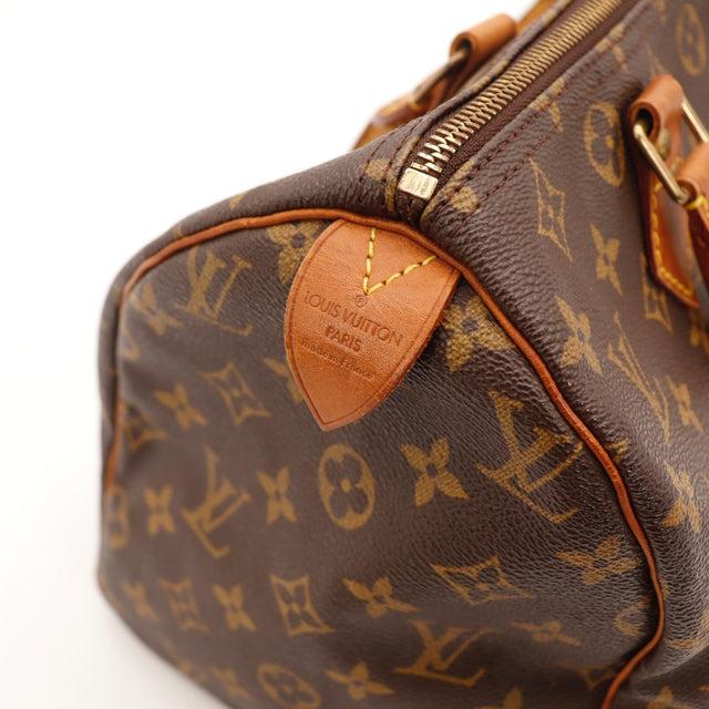 Détail du date code Louis Vuitton Speedy 30 Toile Monogramme occasion authentique — AMANA Vintage