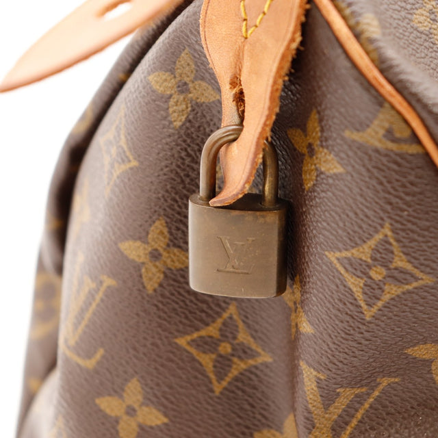 Détail attache anse abîmée cuir foncé Louis Vuitton Speedy 35 — AMANA Vintage