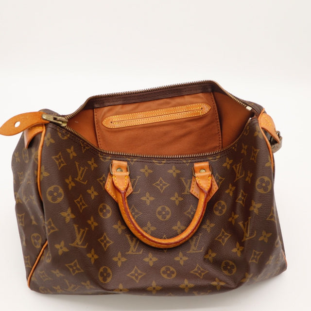 Vue de profil Louis Vuitton Speedy 35 Toile Monogramme occasion authentique — AMANA Vintage
