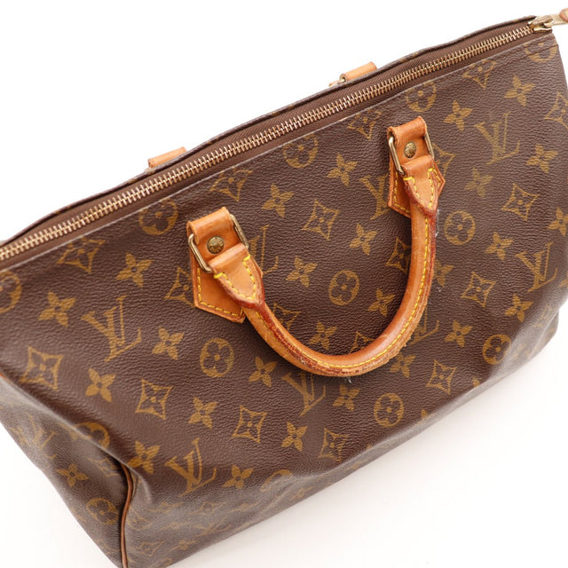 Vue trois quarts haut Louis Vuitton Speedy 35 anse et zip — AMANA Vintage