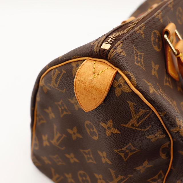 Détail de l'argenterie Louis Vuitton Speedy 30 Toile Monogramme occasion authentique — AMANA Vintage