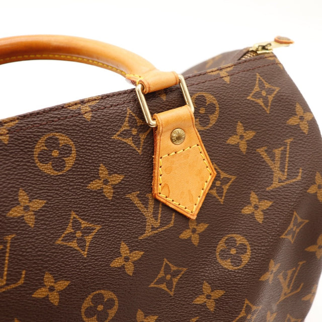 Détail du date code Louis Vuitton Speedy 30 Toile Monogramme occasion authentique — AMANA Vintage