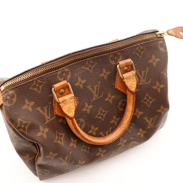 Vue grand angle Louis Vuitton Speedy 25 toile Monogramme anse patinée — AMANA Vintage