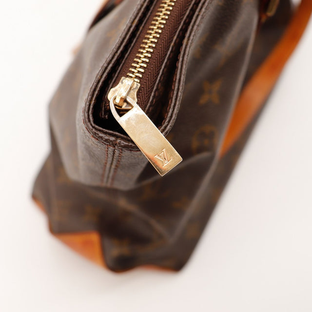 Detail fermeture eclair doree Louis Vuitton Cabas Mezzo — AMANA Vintage