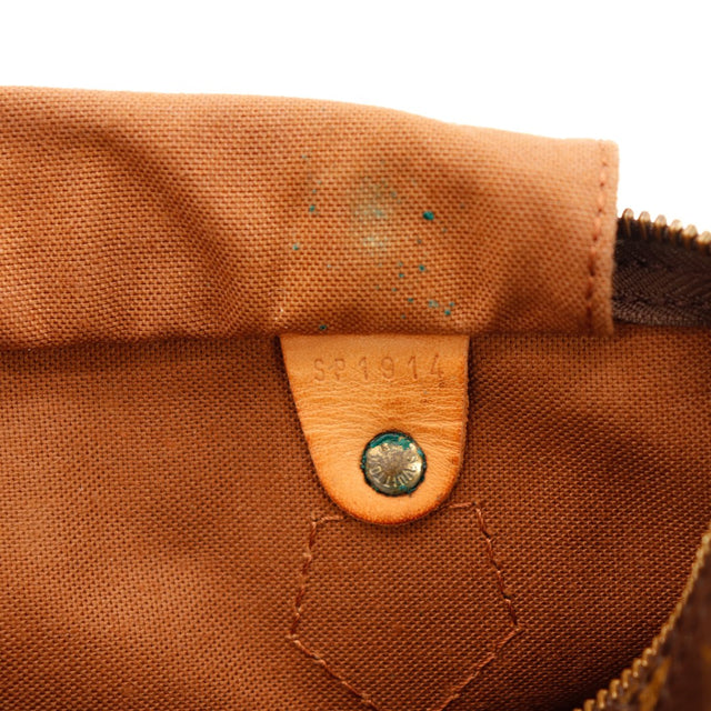 Détail date code SP1914 et vert-de-gris rivet intérieur Louis Vuitton Speedy 30 — AMANA Vintage