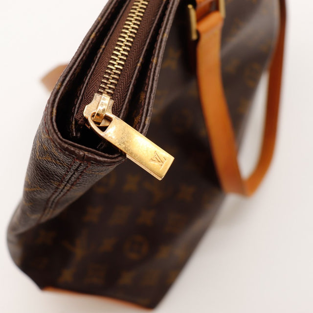 Détail tirette dorée du Louis Vuitton Cabas Mezzo — AMANA Vintage