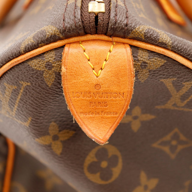 Détail tab vachette estampillé Louis Vuitton Paris made in France Speedy 30 — AMANA Vintage