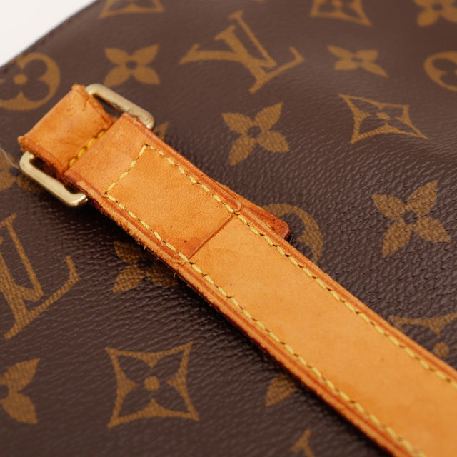 Detail attache anse cuir vachette Louis Vuitton Cabas Mezzo — AMANA Vintage
