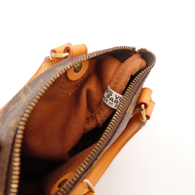 Détail de la patine Louis Vuitton Mini Speedy cuir vachette occasion authentique — AMANA Vintage