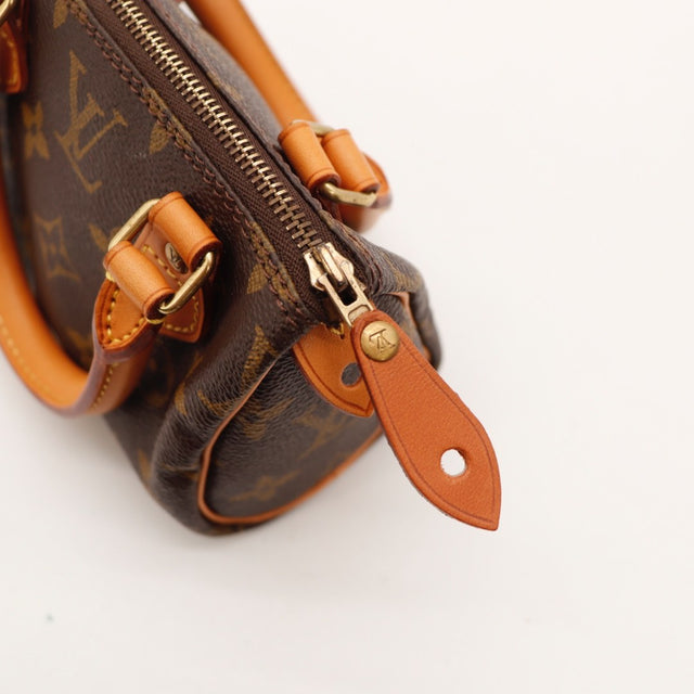 Détail de l'argenterie Louis Vuitton Mini Speedy Toile Monogramme occasion authentique — AMANA Vintage