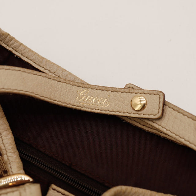 Détail signature Gucci sur la sangle cuir intérieure — AMANA Vintage