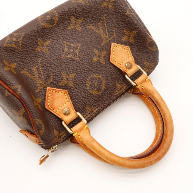Détail de l'argenterie Louis Vuitton Mini Speedy Toile Monogramme occasion authentique — AMANA Vintage