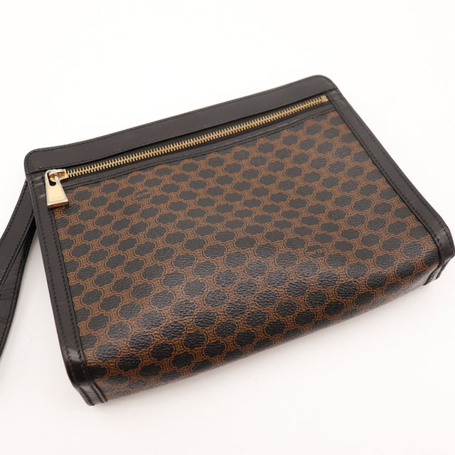 Détail fermeture éclair dorée pochette Céline Macadam occasion authentique — AMANA Vintage