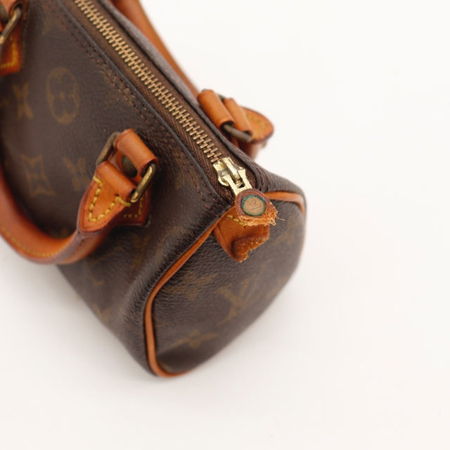 Détail de l'argenterie Louis Vuitton Mini Speedy Toile Monogramme occasion authentique — AMANA Vintage