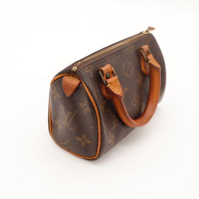 Détail du date code Louis Vuitton Mini Speedy Toile Monogramme occasion authentique — AMANA Vintage