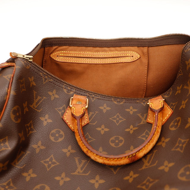 Date code SP0918 Louis Vuitton Speedy 35 intérieur languette cuir — AMANA Vintage
