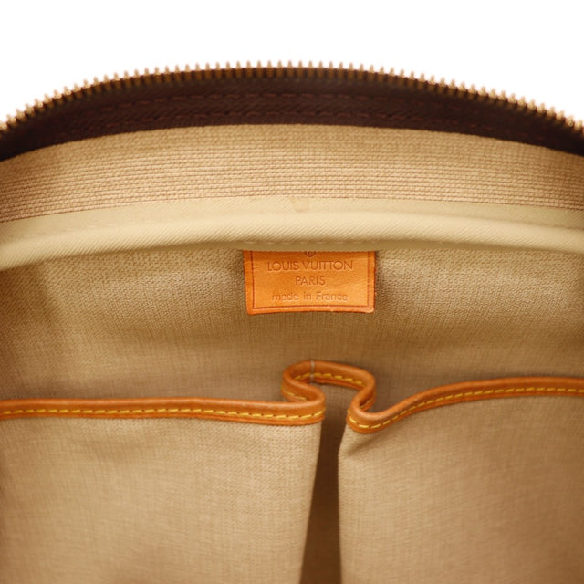 Détail du porte-nom Louis Vuitton Deauville cuir vachette occasion authentique — AMANA Vintage