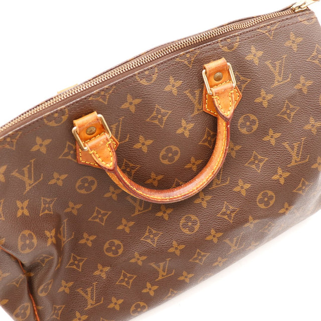 Vue trois quarts haut Louis Vuitton Speedy 35 Monogram anses vachette — AMANA Vintage