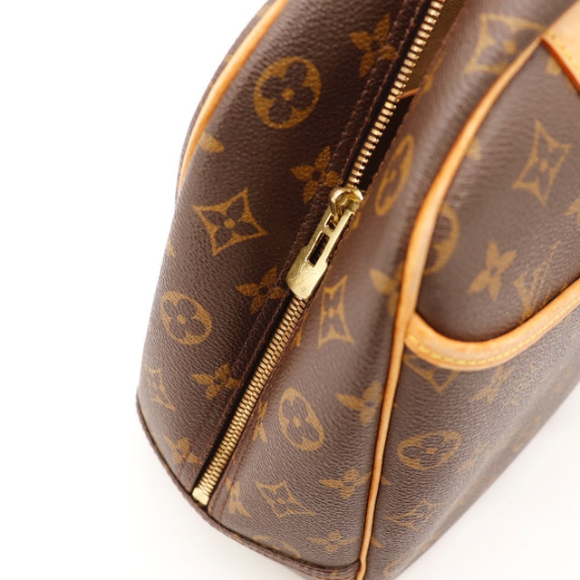 Détail des anses Louis Vuitton Deauville Toile Monogramme occasion authentique — AMANA Vintage