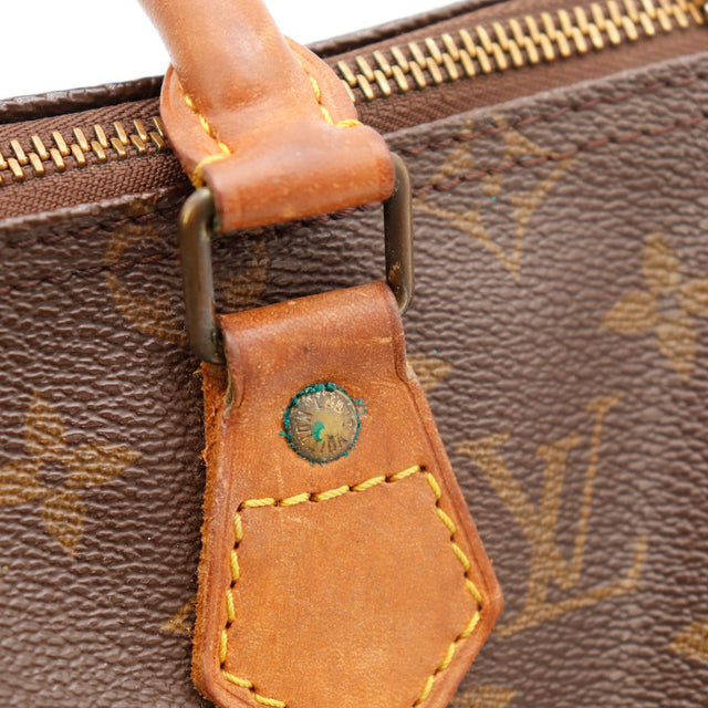 Détail anse cuir vachette patine caramel Louis Vuitton Speedy 25 — AMANA Vintage