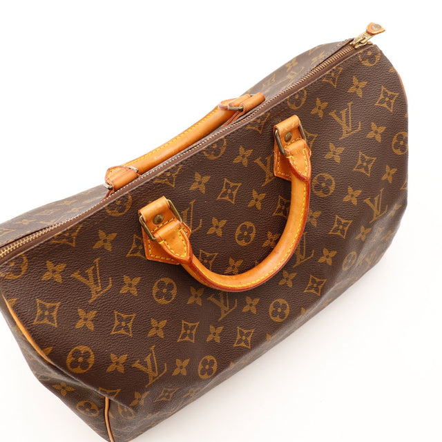 Détail anses cuir vachette Louis Vuitton Speedy 40 occasion authentique — AMANA Vintage