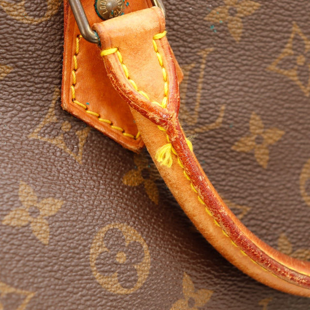 Détail anse cuir vachette patine caramel Louis Vuitton Speedy 30 — AMANA Vintage