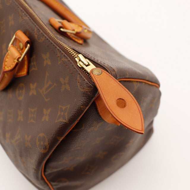 Détail tirette cuir et fermeture éclair Louis Vuitton Speedy 35 — AMANA Vintage
