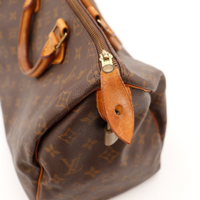 Detail tirette et fermeture eclair Louis Vuitton Speedy 35 — AMANA Vintage