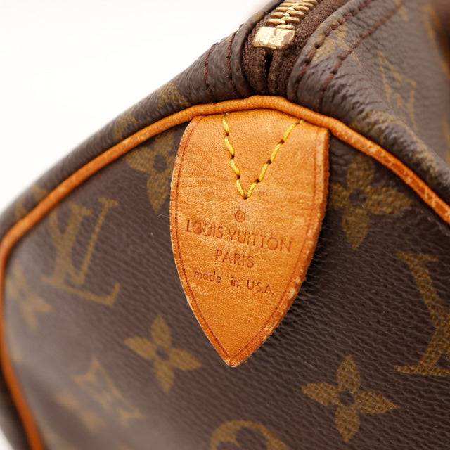 Détail anses et attaches vachette Louis Vuitton Speedy 30 patine caramel — AMANA Vintage