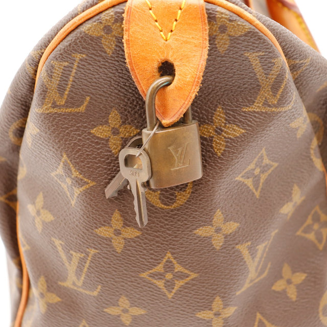 Détail cadenas et clés Louis Vuitton Speedy 30 — AMANA Vintage