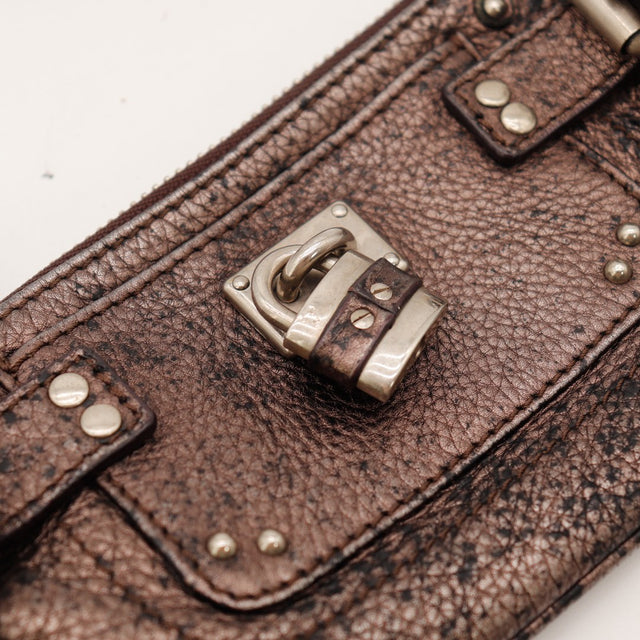 Détail cadenas argenté Chloé Paddington cuir métallisé — AMANA Vintage